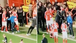 A Charlton Fan Accidentally Injures Krystian Bielik With Slide Tackle In Goal Celebrations