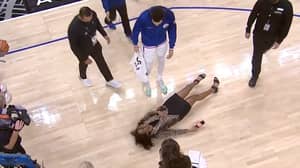 NBA Reporter Takes Nasty Fall After High Heels Slip On Wet Court