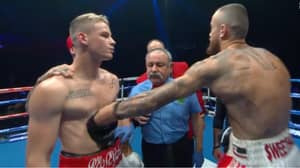 Boxer Andrei Mikhailovich Gets Punched In The Stomach By His Rival Before The Bell