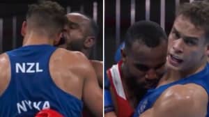 Olympic Boxer Tries To Bite Opponent In Shocking Mike Tyson Imitation