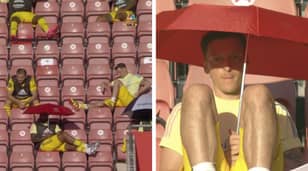 Mesut Ozil & Alexandre Lacazette Caught Casually Relaxing With Parasols During Southampton Vs Arsenal