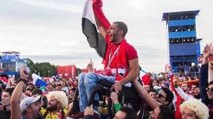Mexican And Colombian Fans Lift A Disabled Egyptian Supporter So He Can Watch The Game 