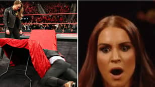 Ronda Rousey Marks WWE Contract Signing By Putting Triple H Through A Table