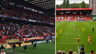 Charlton Fans Throw Packets Of Crisps On The Pitch In Protest