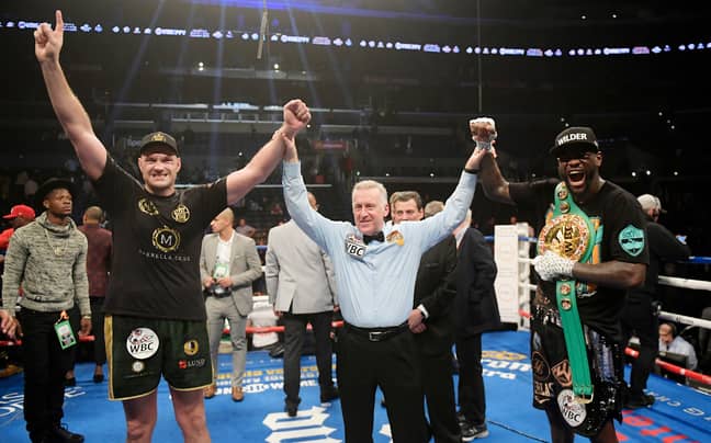 Fury and Wilder both have their hands raised at the end of the fight. Image: PA Images