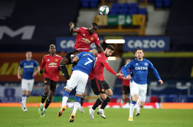 Bailly jumps into Richarlison following the nudge from Fernandes. Image: PA Images