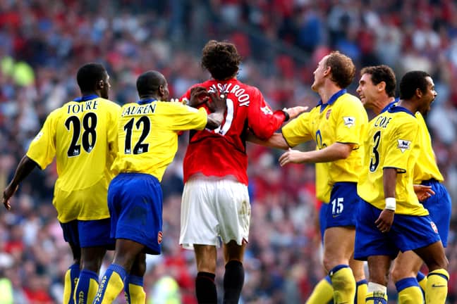Van Nistelrooy gets shoved after missing his penalty. Would have ended the unbeaten season early. Image: PA Images.