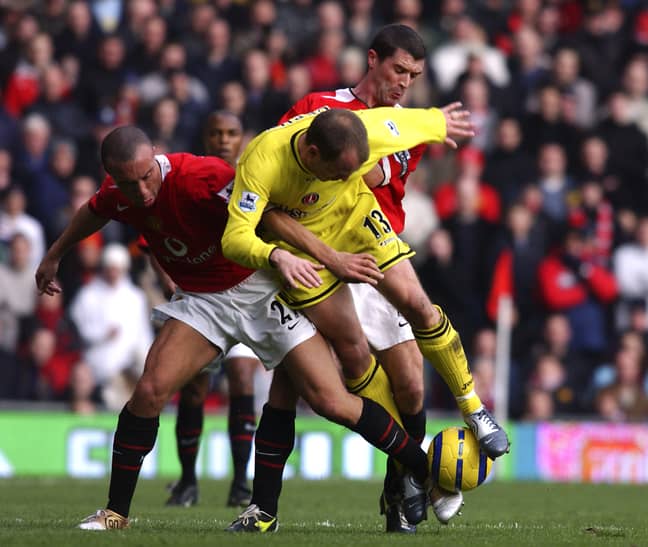 PA: Mikel Silvestre and Roy Keane challenge Danny Murphy.