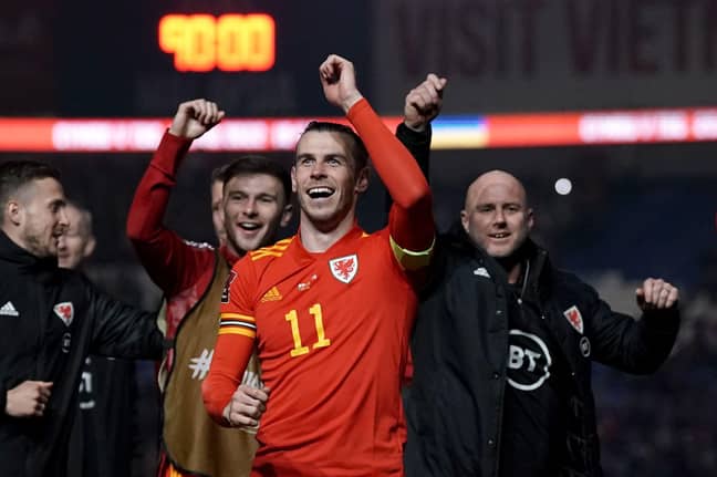 Bale celebrates winning with manager Robert Page on Thursday night. Image: PA Images