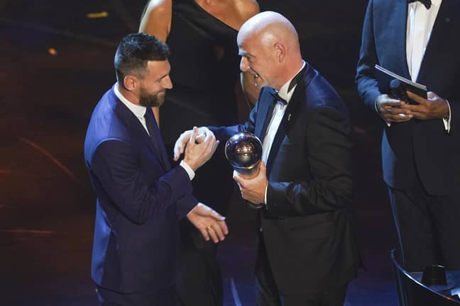 Messi receives his award. Image: PA Images