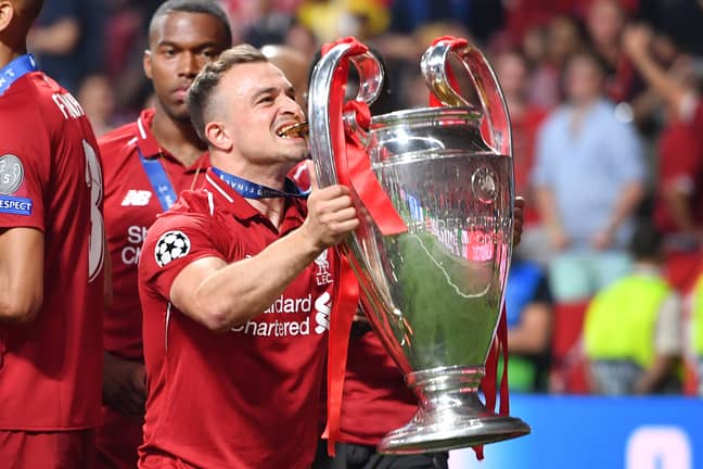 Shaqiri celebrates with the Champions League trophy. Image: PA Images