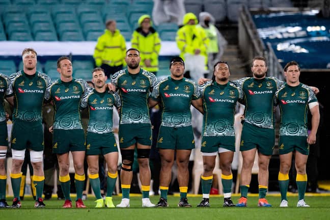 The Wallabies sing along to the anthem. Credit: PA