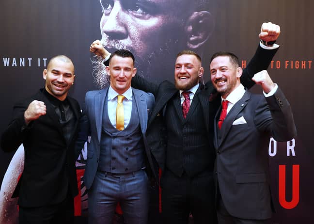 Conor McGregor with his training partner Artem Lobov (left), striking coach Owen Roddy (centre) and head coach John Kavanagh (right). Credit: PA 