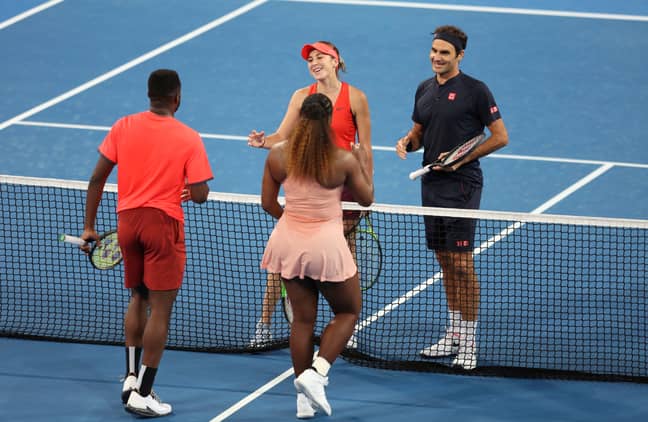 Federer and Swiss teammate Belinda Bencic beat Williams and Frances Tiafoe. Credit: PA