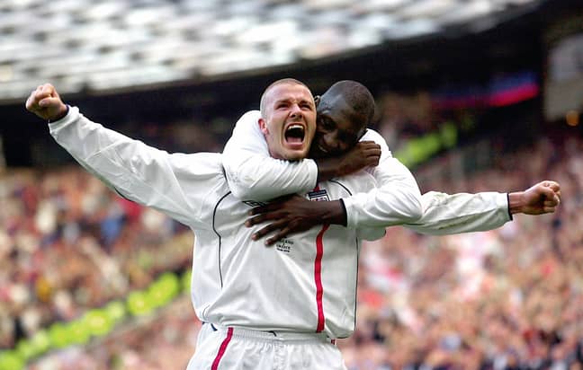 Emile Heskey celebrates with Beckham after his most famous free kick. Image: PA Images