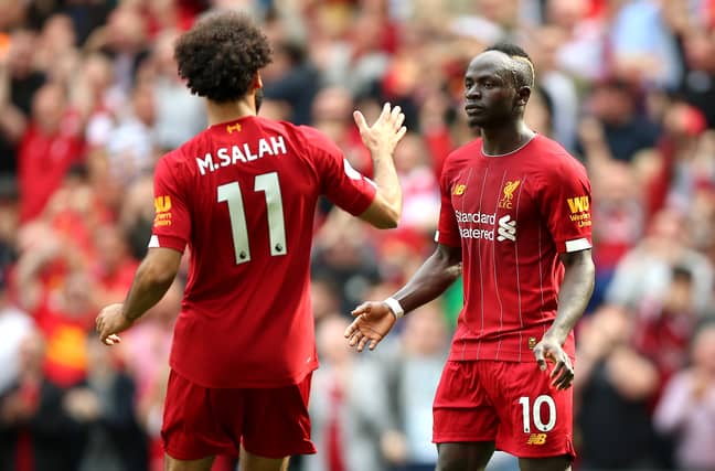 Mane and teammate Mohamed Salah in action today (Image Credit: PA)