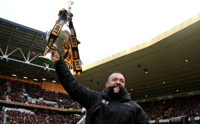 Nuno with the Championship title. Image: PA Images