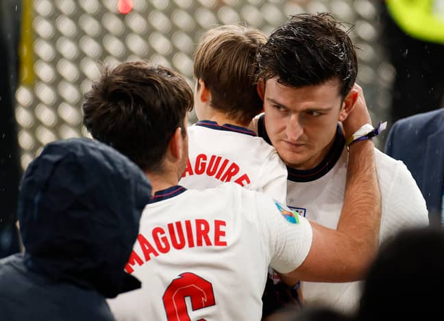 Maguire speaking with his family after full time. Image: PA Images