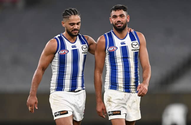 North Melbourne's Aaron Hall &amp; Tarryn Thomas. Credit: Getty Images.