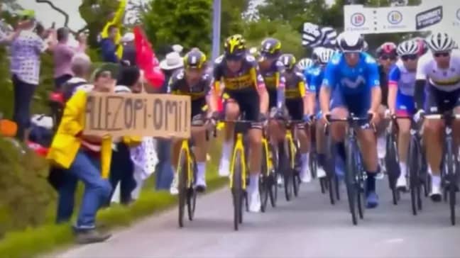 A fan holding a sign caused a massive pile-up in stage one of the Tour de France. Credit: Twitter/Eurosport