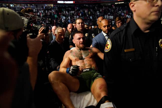 McGregor is stretchered out after his loss. Image: PA Images