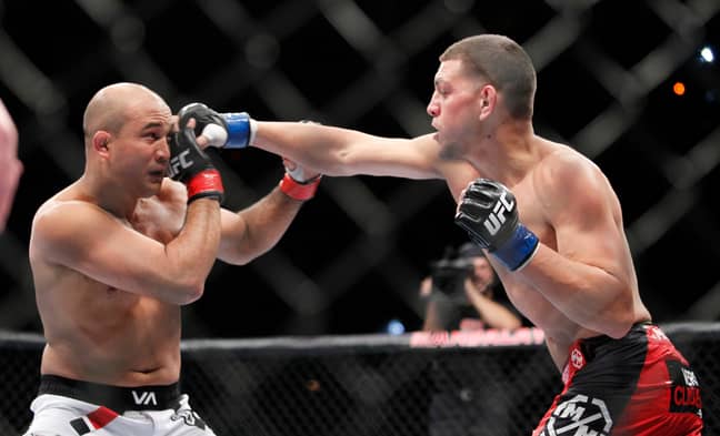Diaz landing a punch on BJ Penn at UFC 137. Image: PA