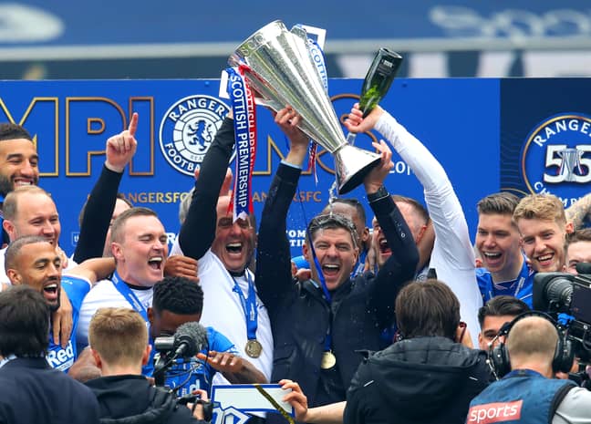 PA: Steven Gerrard celebrates winning the Scottish Premiership title with Rangers.