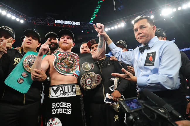 Alvarez with the belts he won against GGG. Image: PA Images