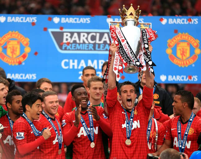Van Persie lifts his only league title with United. Image: PA Images.
