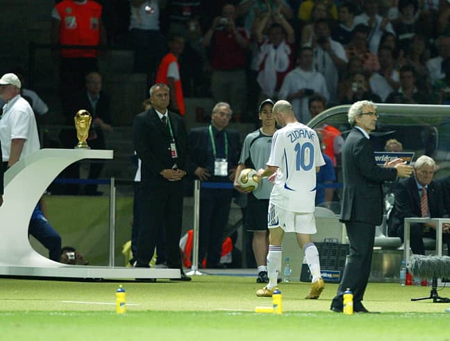 Zidane walks past the trophy after his red card. Image: PA Images