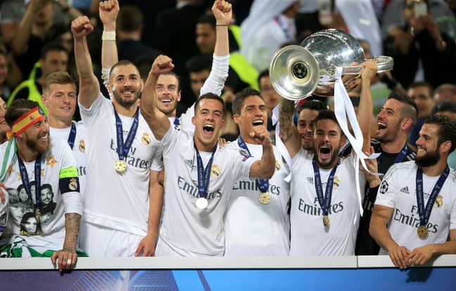 PA: Isco celebrates with the Champions League trophy.