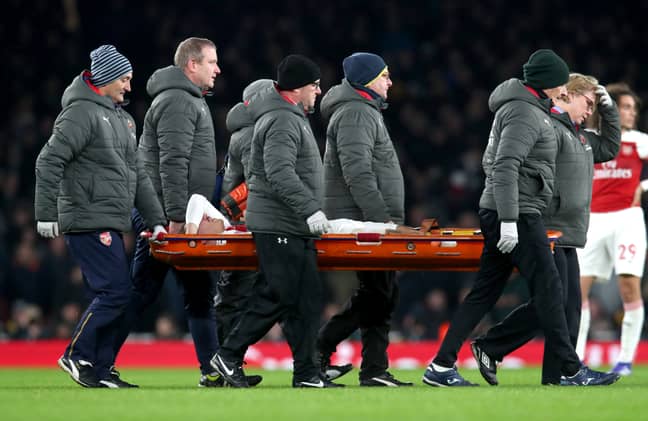 Bellerin stretchered off against Chelsea in January 2019. Image: PA Images