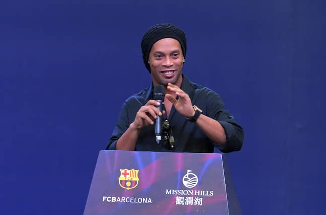 Ronaldinho in China as Barca's ambassador. Image: PA Images