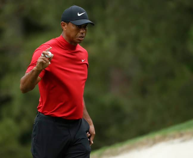 Woods was wearing his distinctive fourth round attire. Image: PA Images
