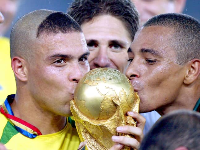 PA: Ronaldo celebrates winning the World Cup with Brazil in 2002.