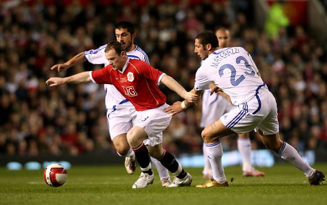 Rooney gets away from Marco Materazzi and Gennaro Gattuso. Image: PA Images
