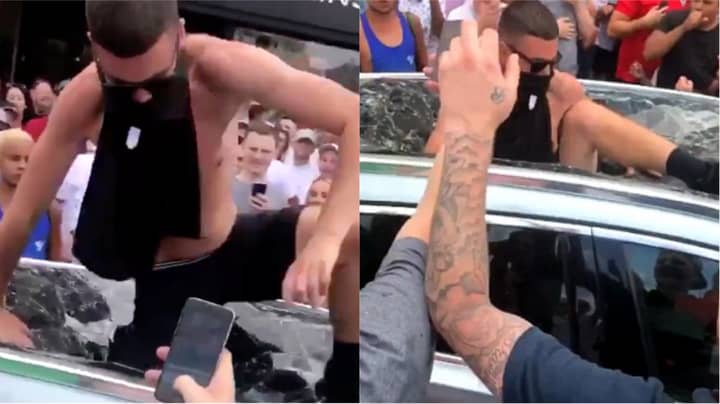 ​Man Arrested For Jumping Through Taxi Roof After England Win