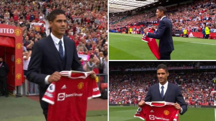 Raphael Varane Walks Out To Incredible Reception At Old Trafford After Being Unveiled Before Kick-Off vs Leeds