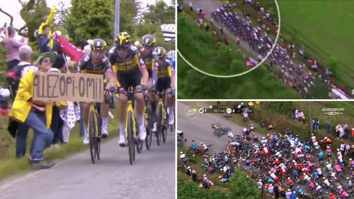 Woman Causes Huge Crash In Tour de France With Homemade Sign